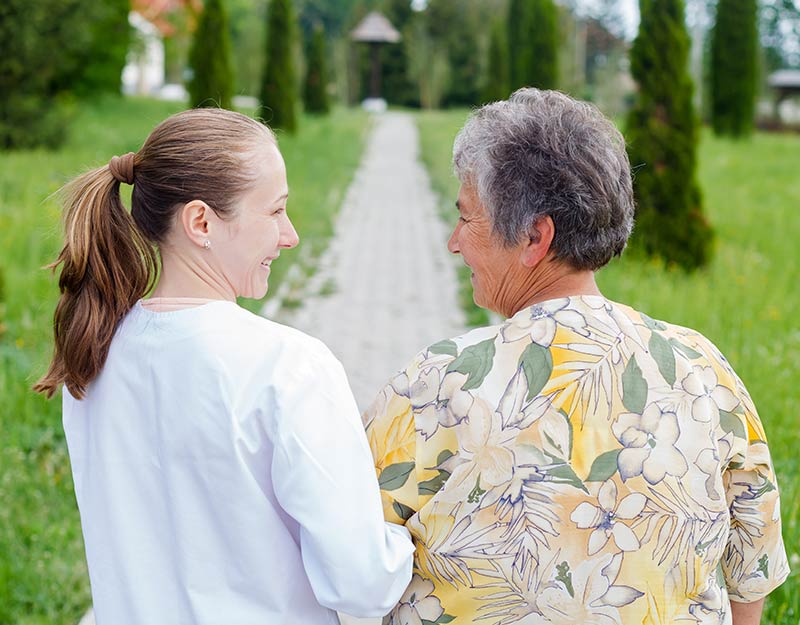 Caregiver Walking with Patient